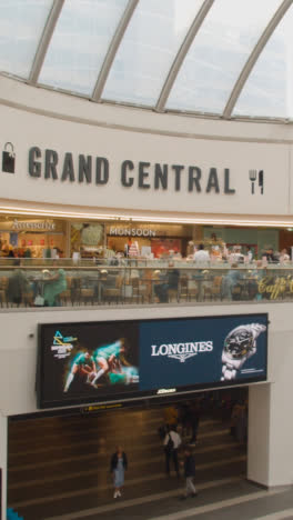 Vertical-Video-Of-Grand-Central-Shopping-Centre-And-New-Street-Railway-Station-With-Shoppers-In-Birmingham-UK-1